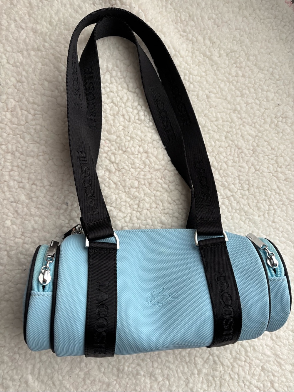 Lacoste Y2K Light Blue Mini Barrel Shoulder Bag with Black Straps